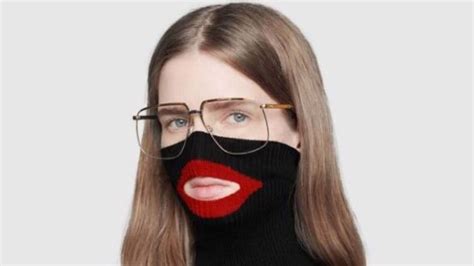 gucci black face red lips and bow sweater|Gucci controversy.